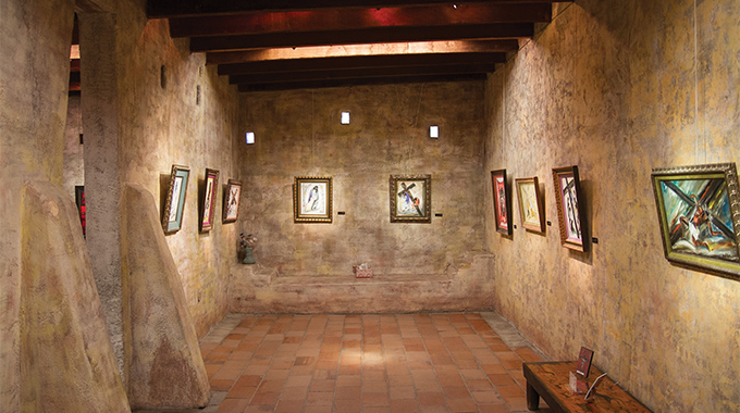 Art hung on the wall inside the Sun Museum DeGrazia Gallery.